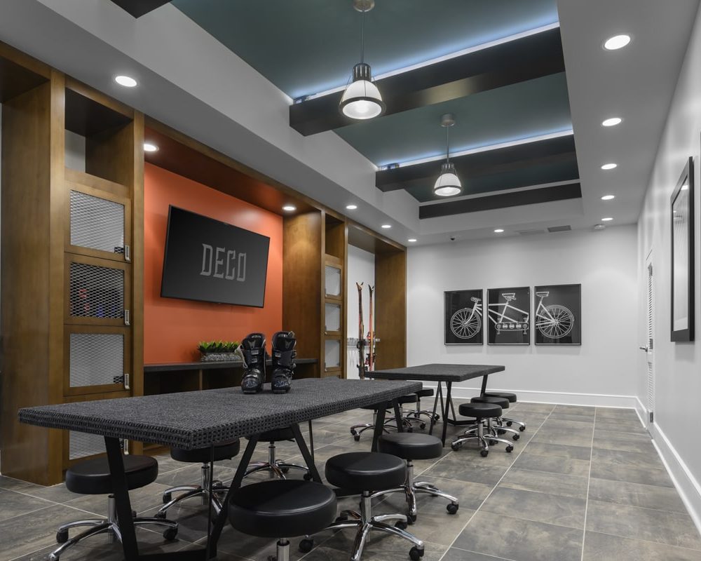 Denver CO Luxury Apartments - DECO Apartments Business Center With Large Conference Room Table and Chairs