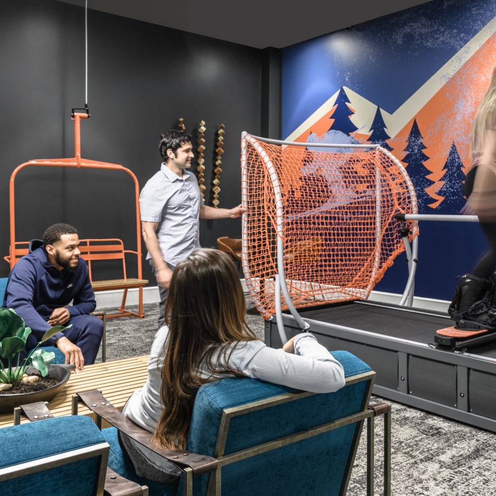 Eco-Friendly Apartments in Denver, CO - DECO Apartments Ski Simulator in Resident Game Area